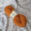 wolle merino angora bouclelaine orange gelb